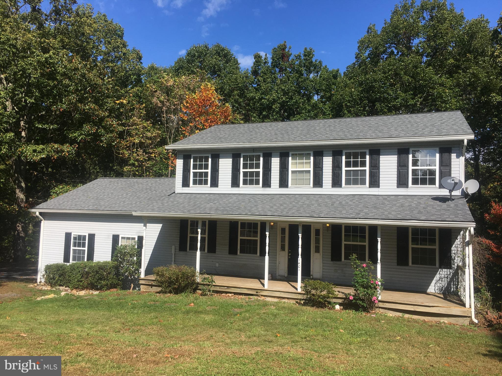 1401 Hillandale Road Front Royal, VA 22630 - Photo 1 of 2 a front view of a house with a yard