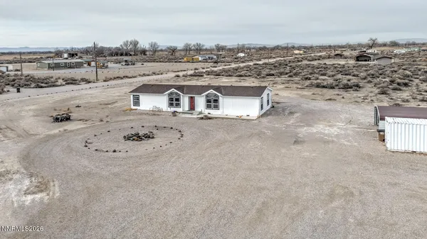 an aerial view of a house with a outdoor space