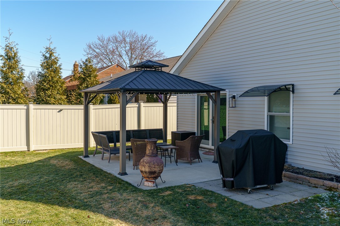 7462 Pearl Road Cleveland, OH 44130 - Photo 24 of 32 View of patio with area for grilling and a gazebo