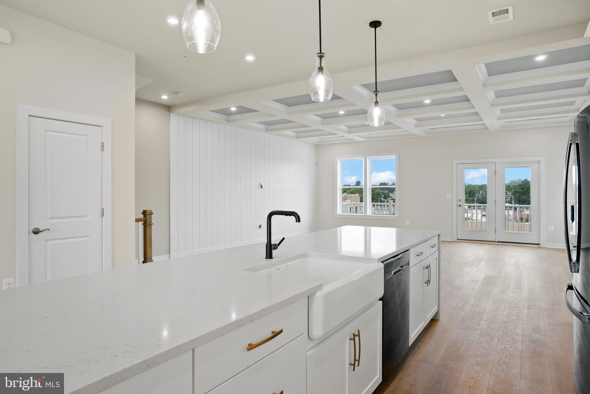6713 Belcrest Road Hyattsville, MD 20782 - Photo 2 of 29 a kitchen with stainless steel appliances granite countertop a sink a oven and a large window