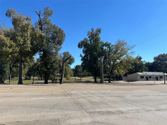 a view of road with trees