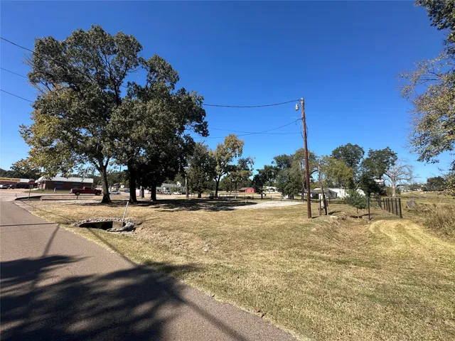 a view of road with trees