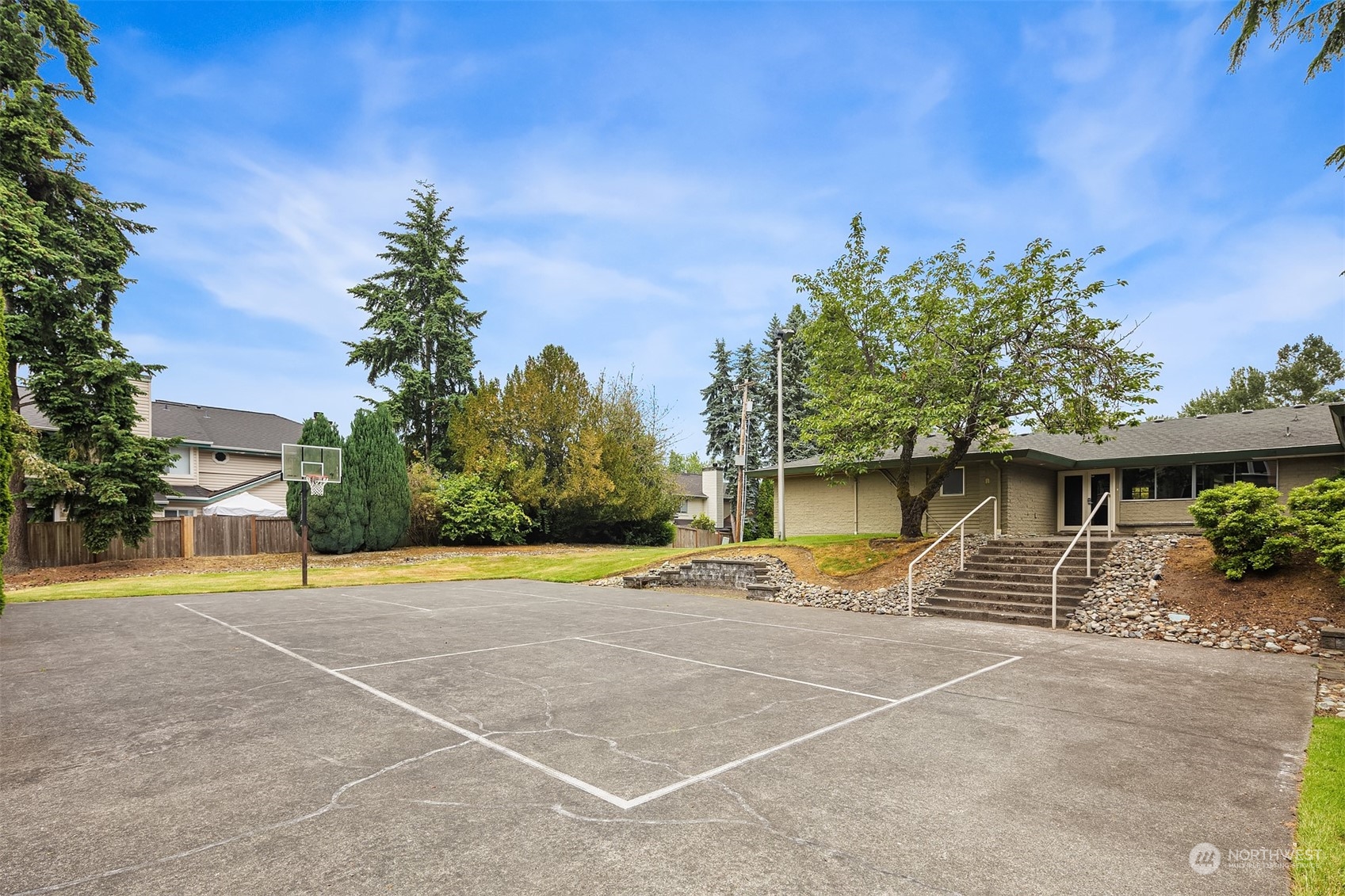 20320 Bothell Everett Highway, Unit D304 Bothell, WA 98012 - Photo 17 of 21 a view of a house with a yard and potted plants