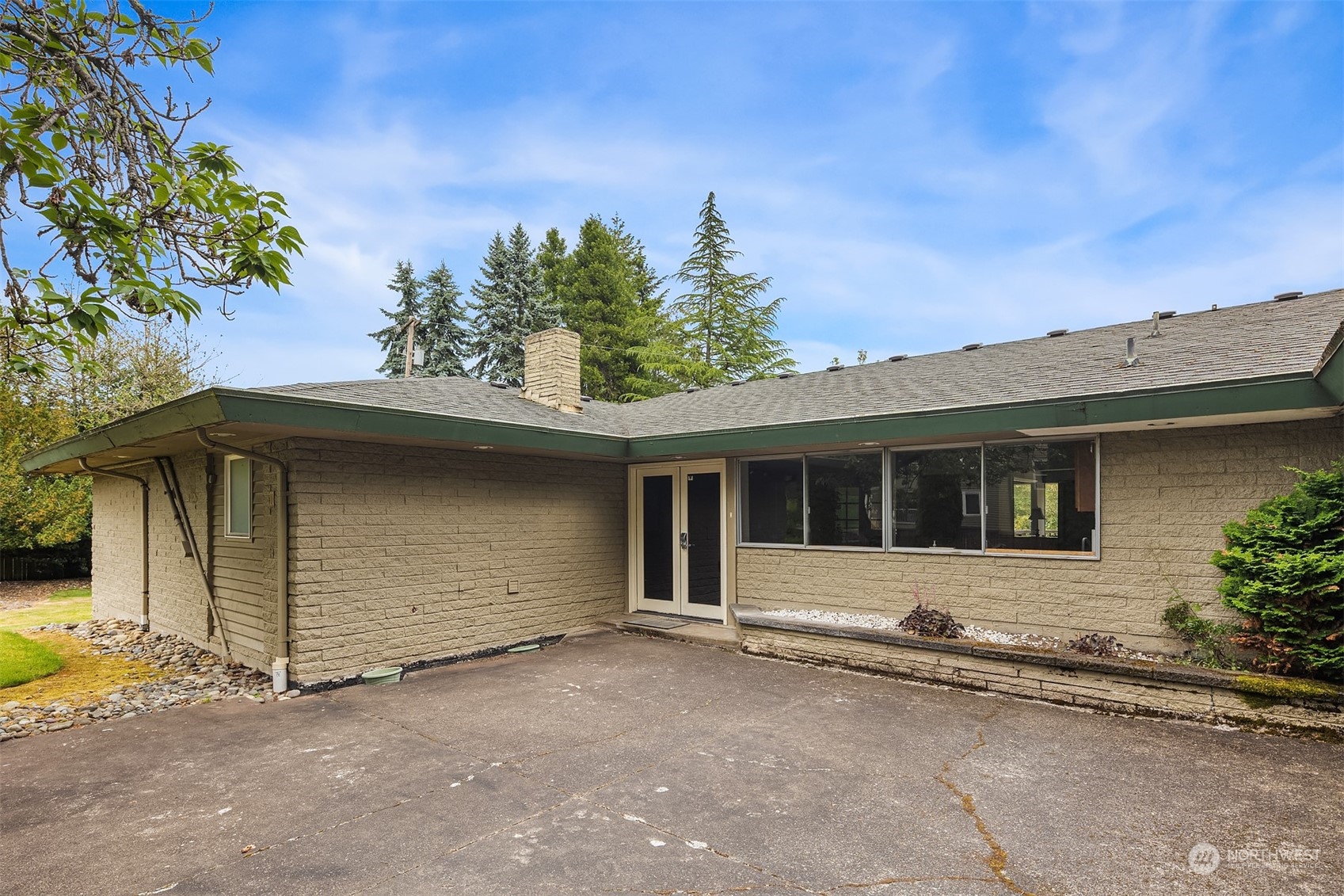 20320 Bothell Everett Highway, Unit D304 Bothell, WA 98012 - Photo 19 of 21 front view of a house with a garage