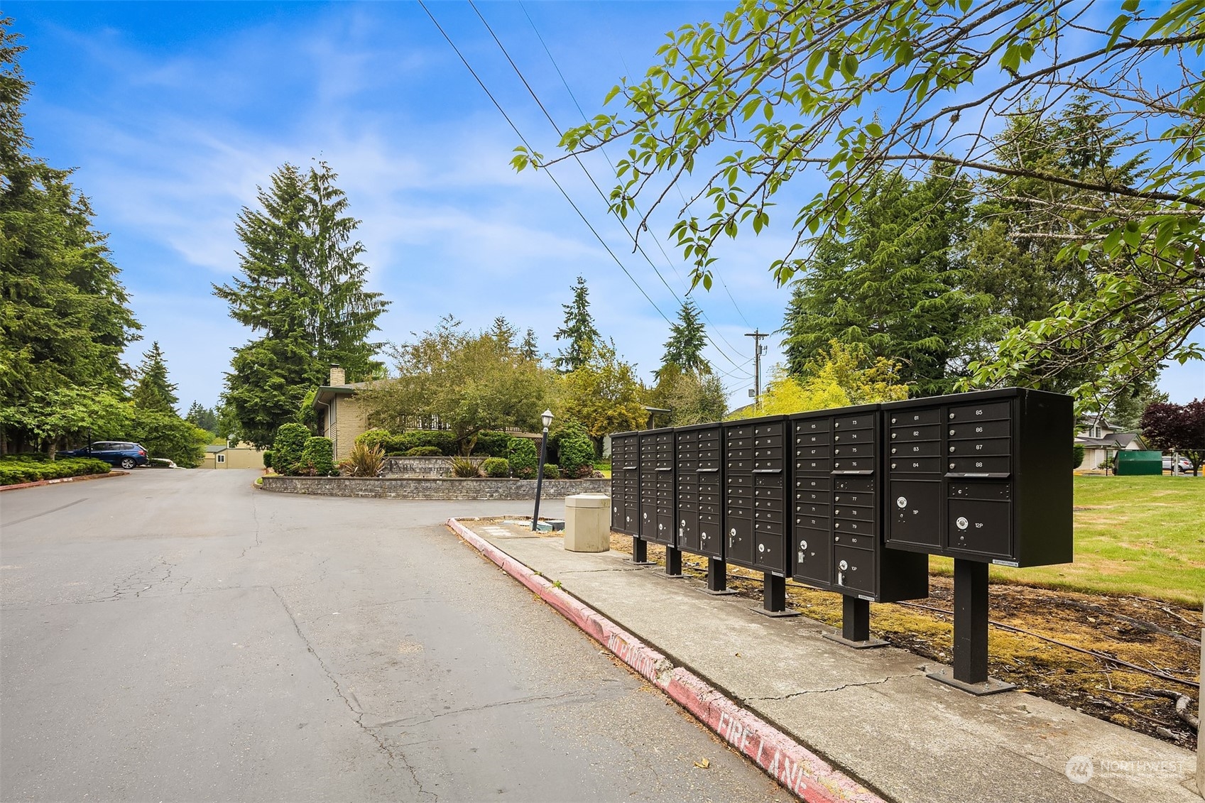 20320 Bothell Everett Highway, Unit D304 Bothell, WA 98012 - Photo 20 of 21 a view of a street with wooden fence