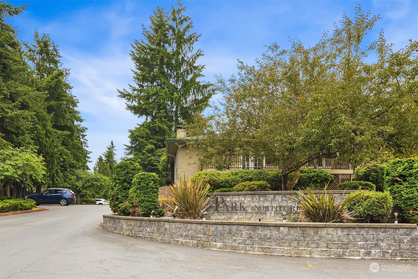 20320 Bothell Everett Highway, Unit D304 Bothell, WA 98012 - Photo 21 of 21 a view of a street with a tree