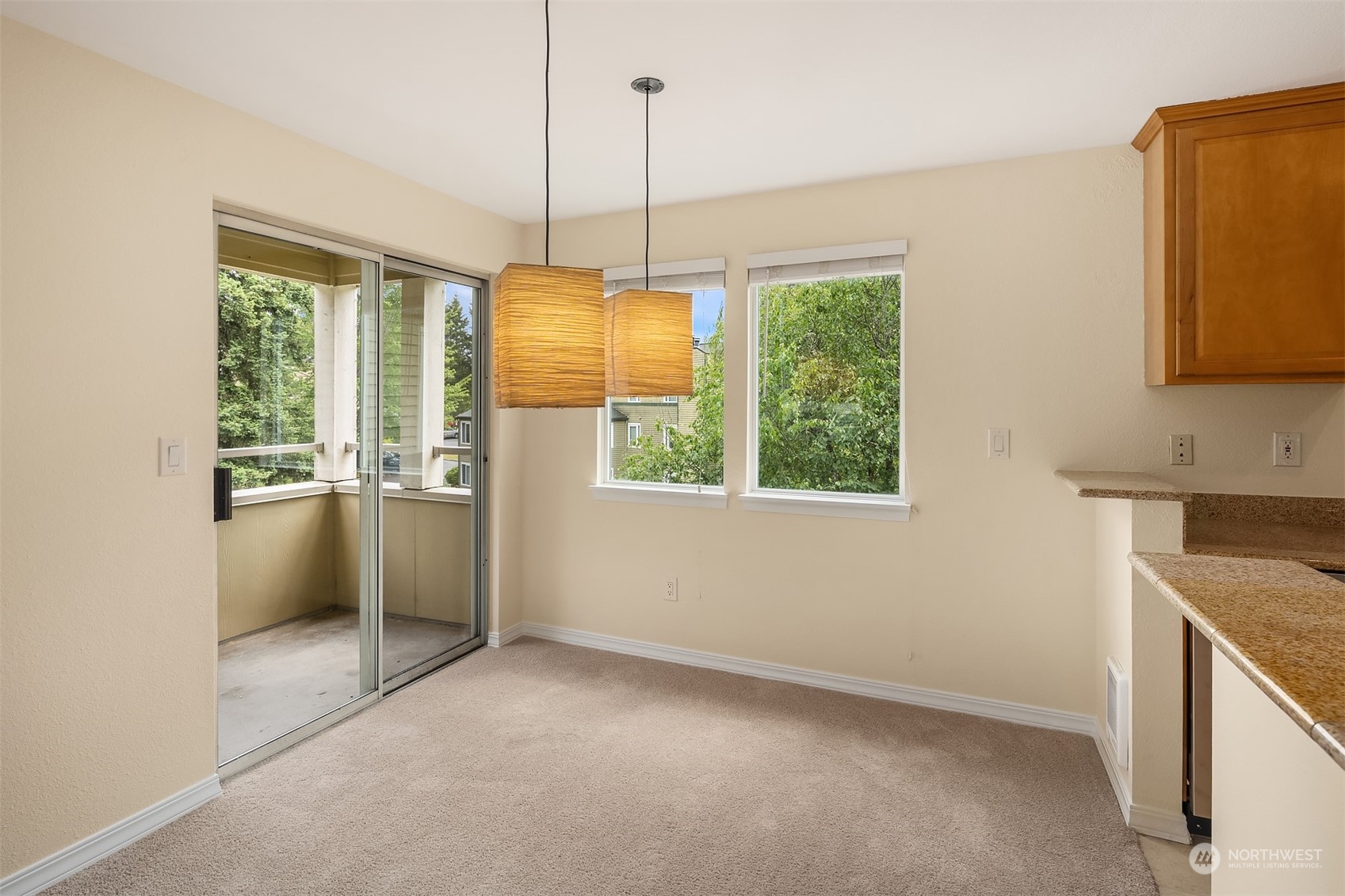 20320 Bothell Everett Highway, Unit D304 Bothell, WA 98012 - Photo 5 of 21 a area with window and a kitchen view