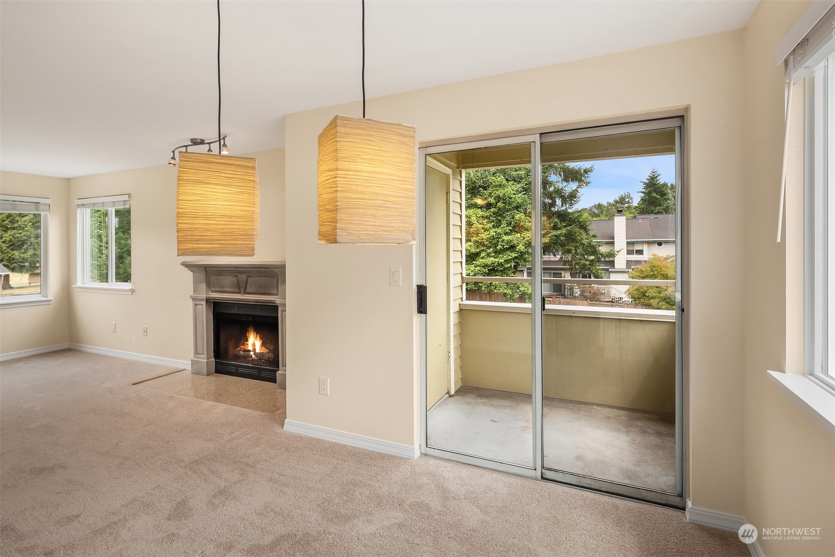 20320 Bothell Everett Highway, Unit D304 Bothell, WA 98012 - Photo 6 of 21 a view of livingroom with furniture fire place and window