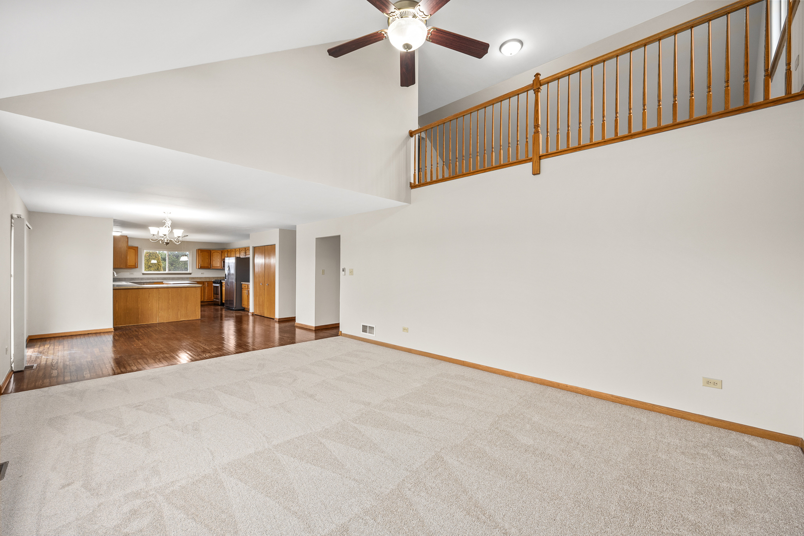 25210 Plainview Drive Channahon, IL 60410 - Photo 14 of 33 a view of an empty room with cabinet and hardwood floor