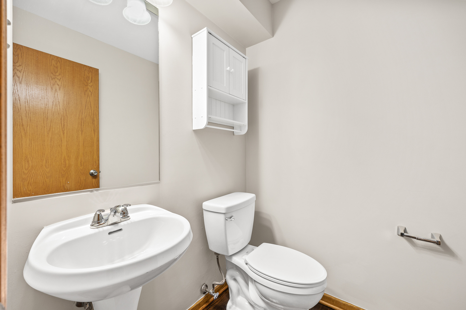 25210 Plainview Drive Channahon, IL 60410 - Photo 16 of 33 a bathroom with a toilet a sink and mirror