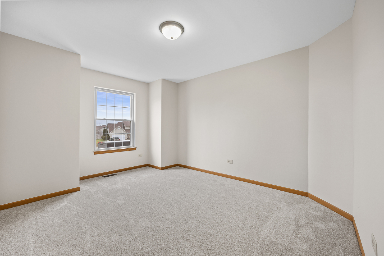 25210 Plainview Drive Channahon, IL 60410 - Photo 23 of 33 an empty room with windows