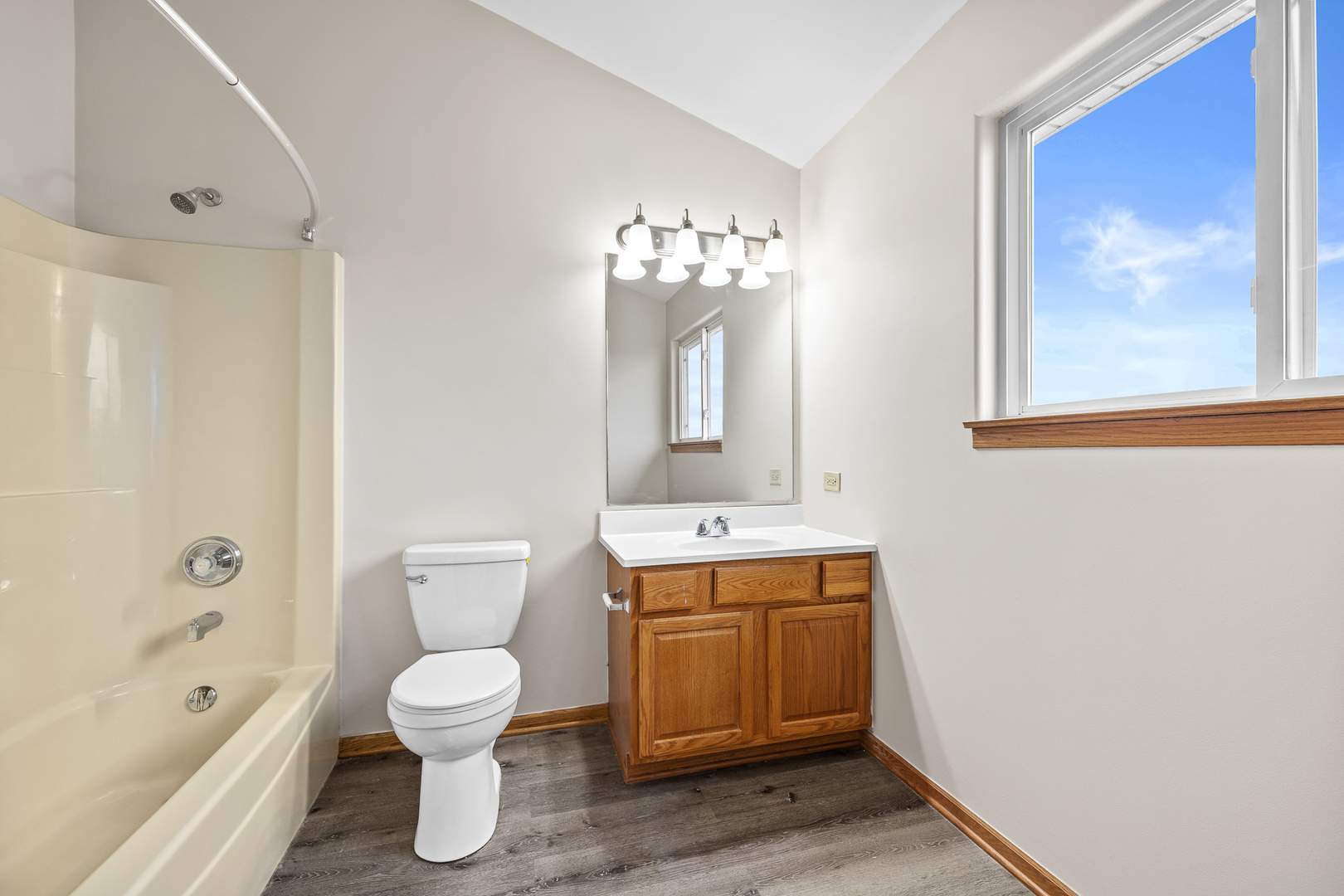 25210 Plainview Drive Channahon, IL 60410 - Photo 25 of 33 a bathroom with a toilet sink and mirror