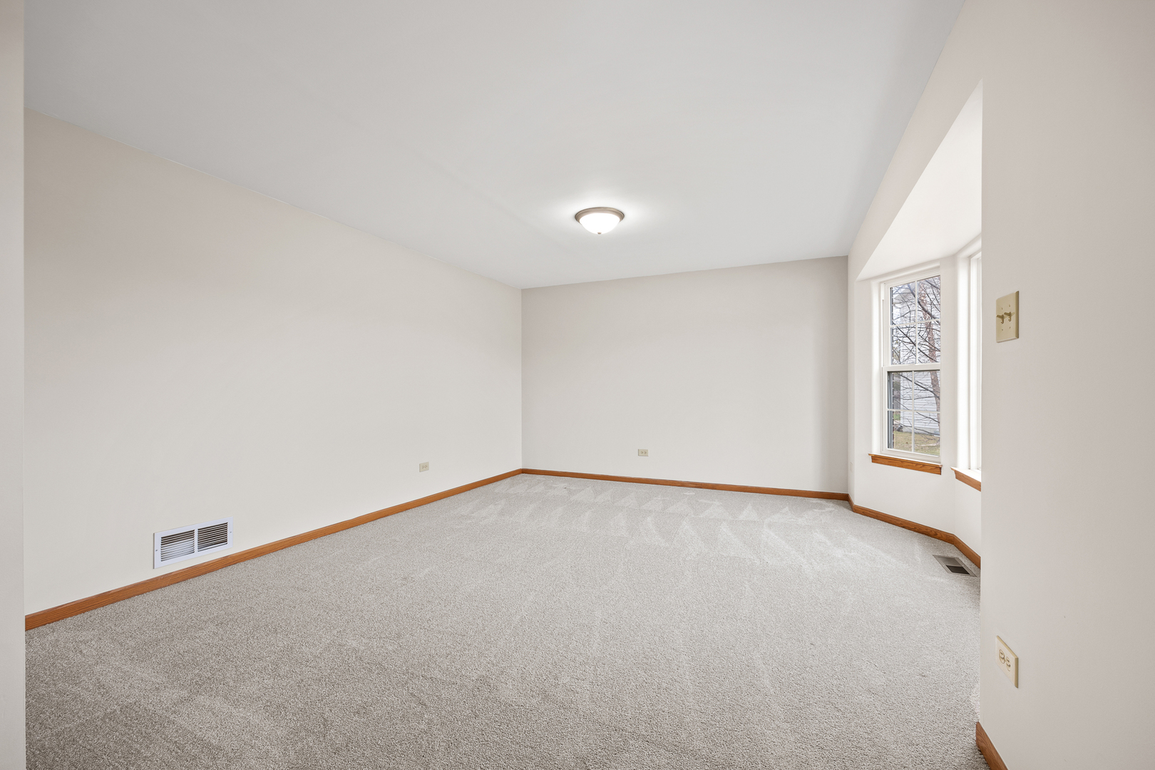 25210 Plainview Drive Channahon, IL 60410 - Photo 5 of 33 a view of an empty room with a window