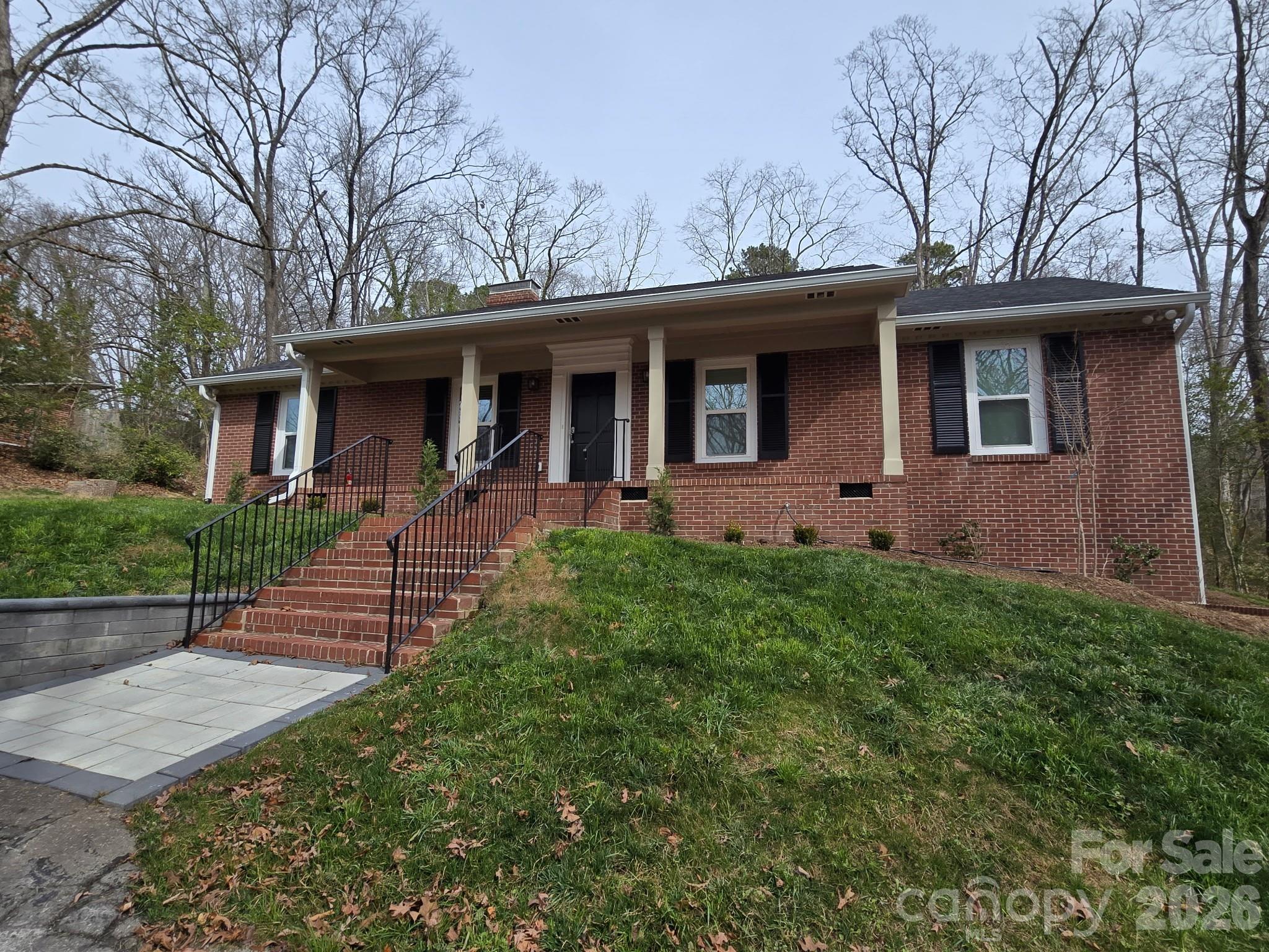 126 Sunset Drive Chester, SC 29706 - Photo 29 of 31 a front view of a house with garden