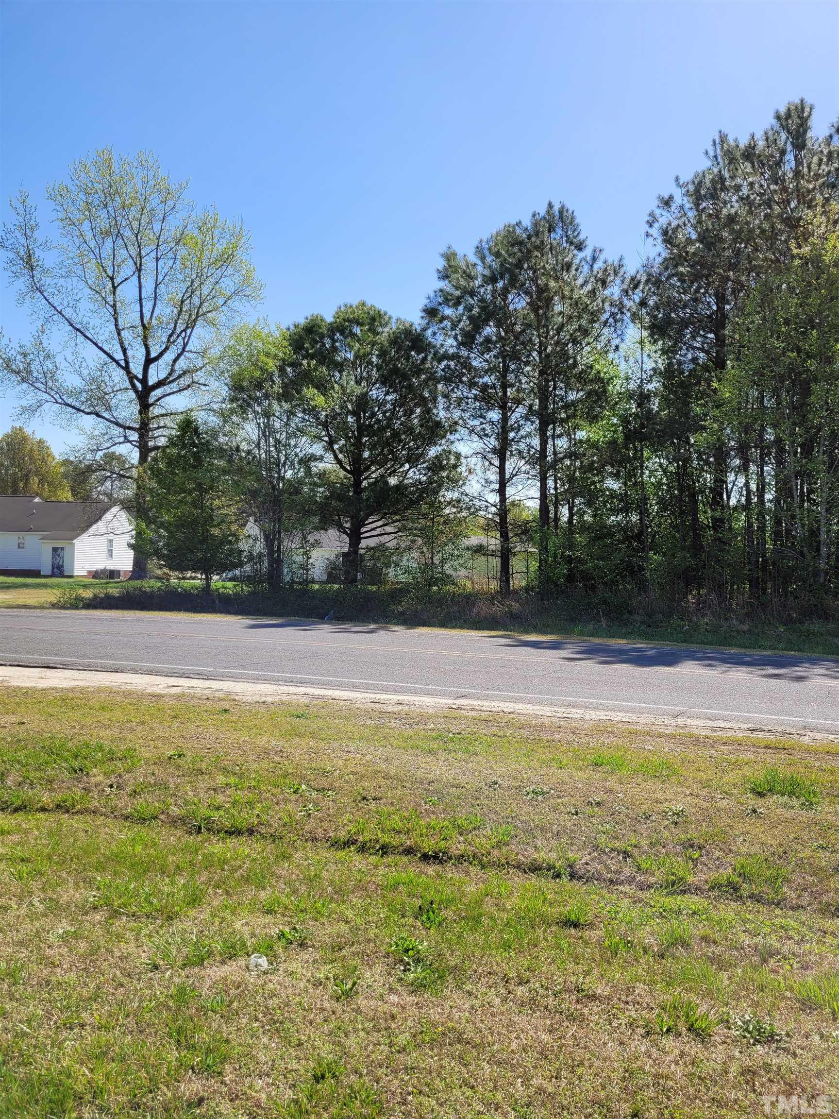 0 Water Plant Road East Zebulon, NC 27597 - Photo 2 of 8 a view of outdoor space with swimming pool and trees