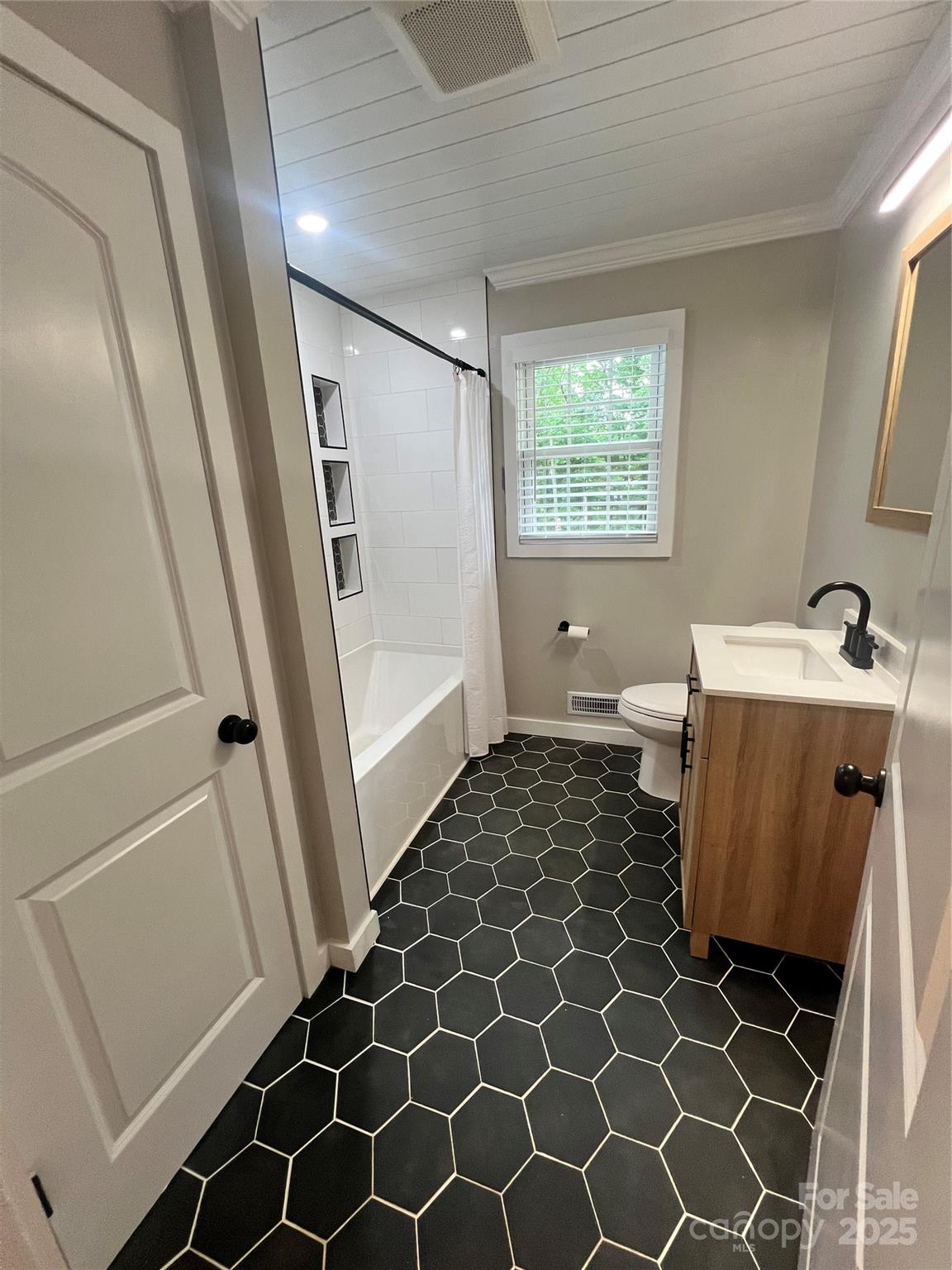 800 Charles Road Shelby, NC 28152 - Photo 18 of 21 a bathroom with a sink and a mirror