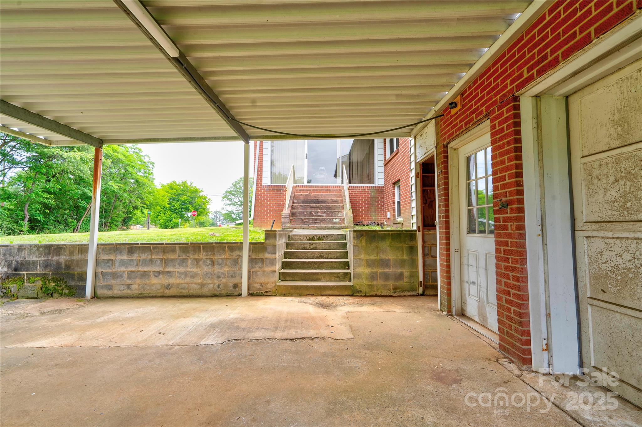 800 Charles Road Shelby, NC 28152 - Photo 7 of 21 a front view of a house with a garden