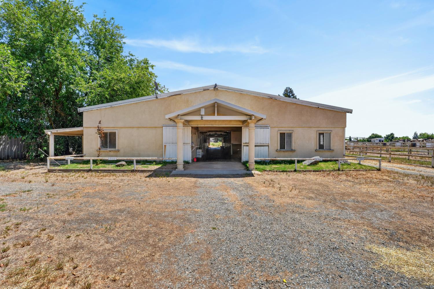 24390 North Jack Tone Road Acampo, CA 95220 - Photo 6 of 40 Breeding Barn. 16- 12x24 stalls, vet room, breeding stock, tack room, misting system with auto water and lights.