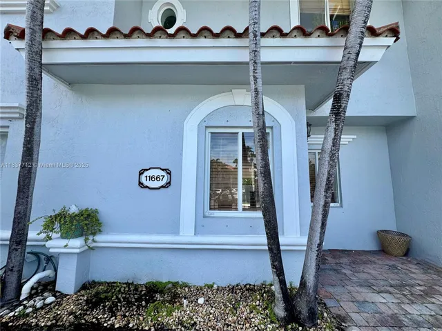 a front view of a house with entryway