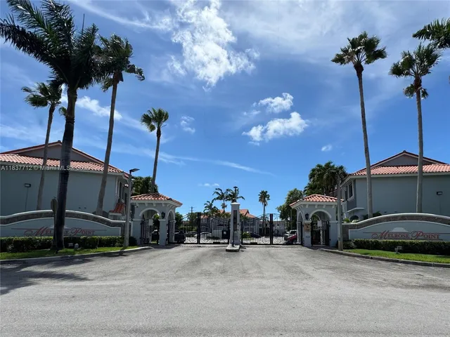 a view of a car park in front of a building