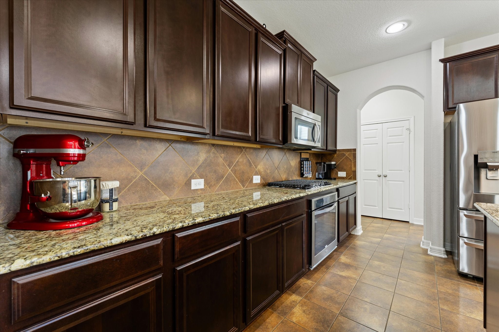 13302 Rising Bluff Lane Cypress, TX 77429 - Photo 11 of 38 Ample storage and prep space, gas cooking