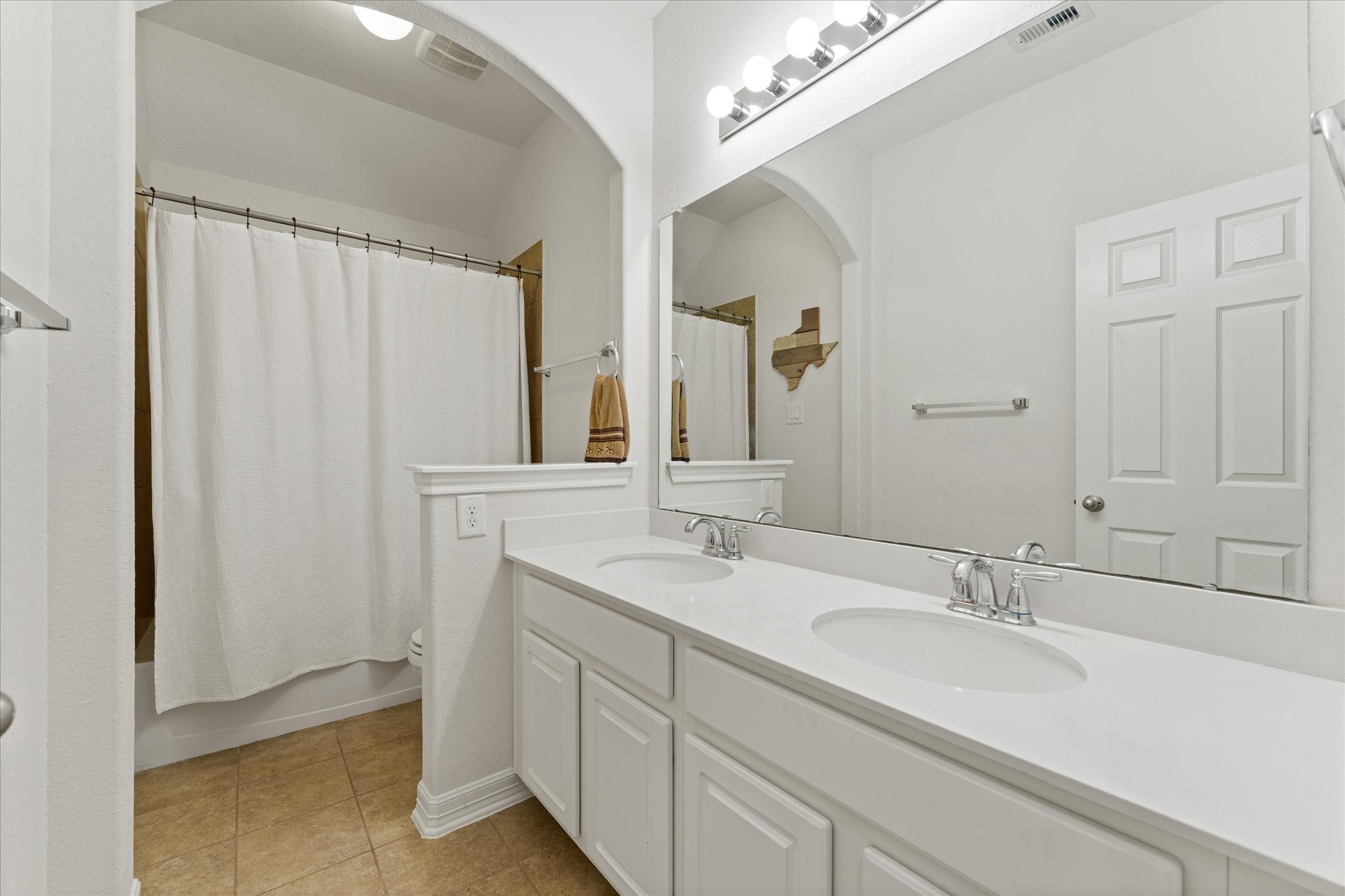 13302 Rising Bluff Lane Cypress, TX 77429 - Photo 20 of 38 Second bathroom with dual sinks and tub/shower combo