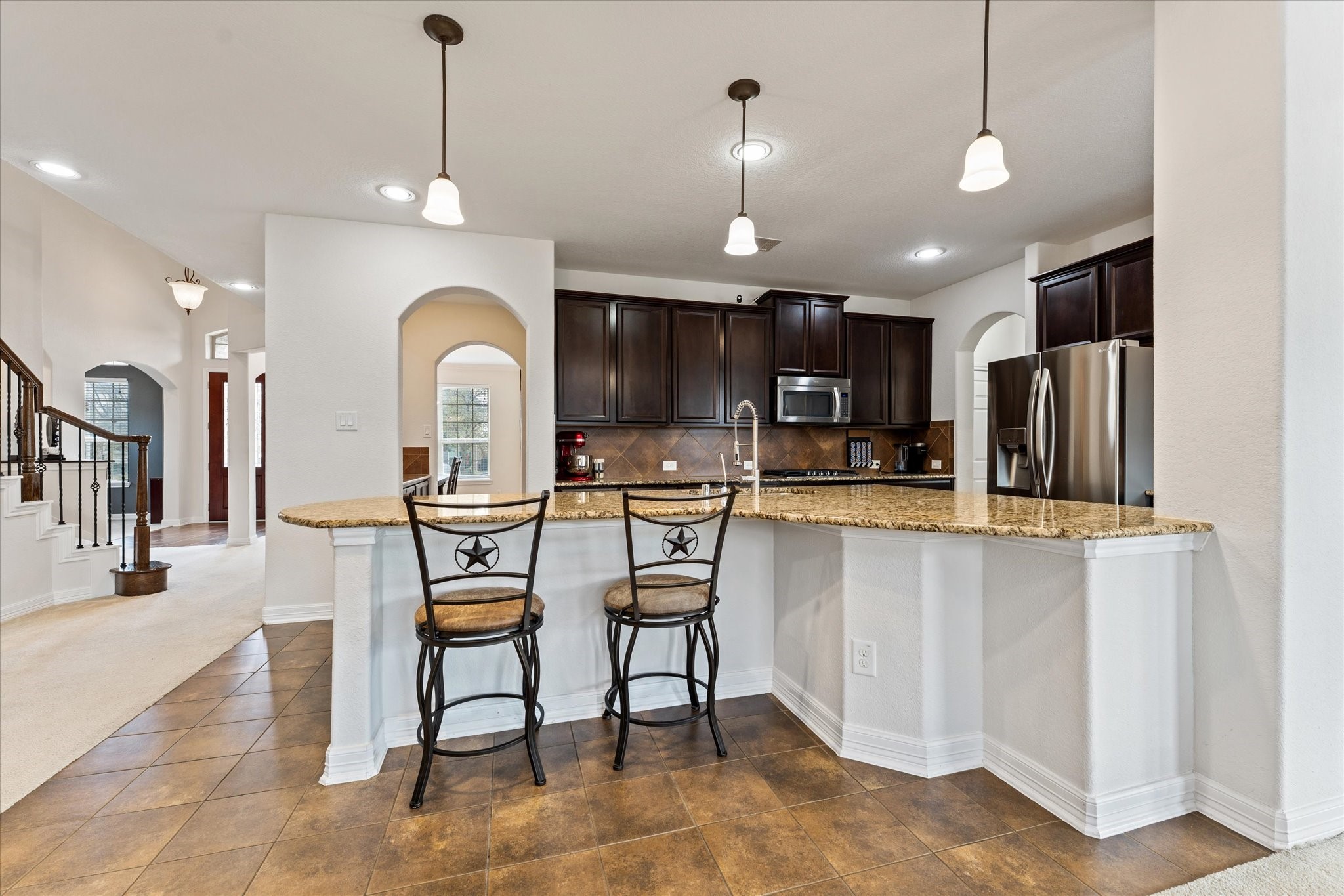 13302 Rising Bluff Lane Cypress, TX 77429 - Photo 10 of 38 Additional casual dining around the large breakfast bar