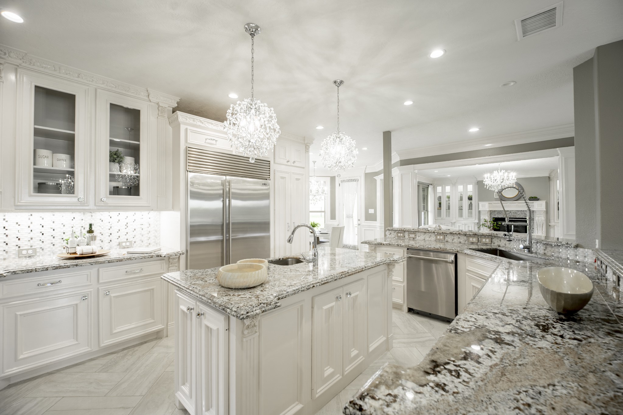 10887 Decatur Street Willis, TX 77318 - Photo 14 of 50 a kitchen with a sink stove and cabinets