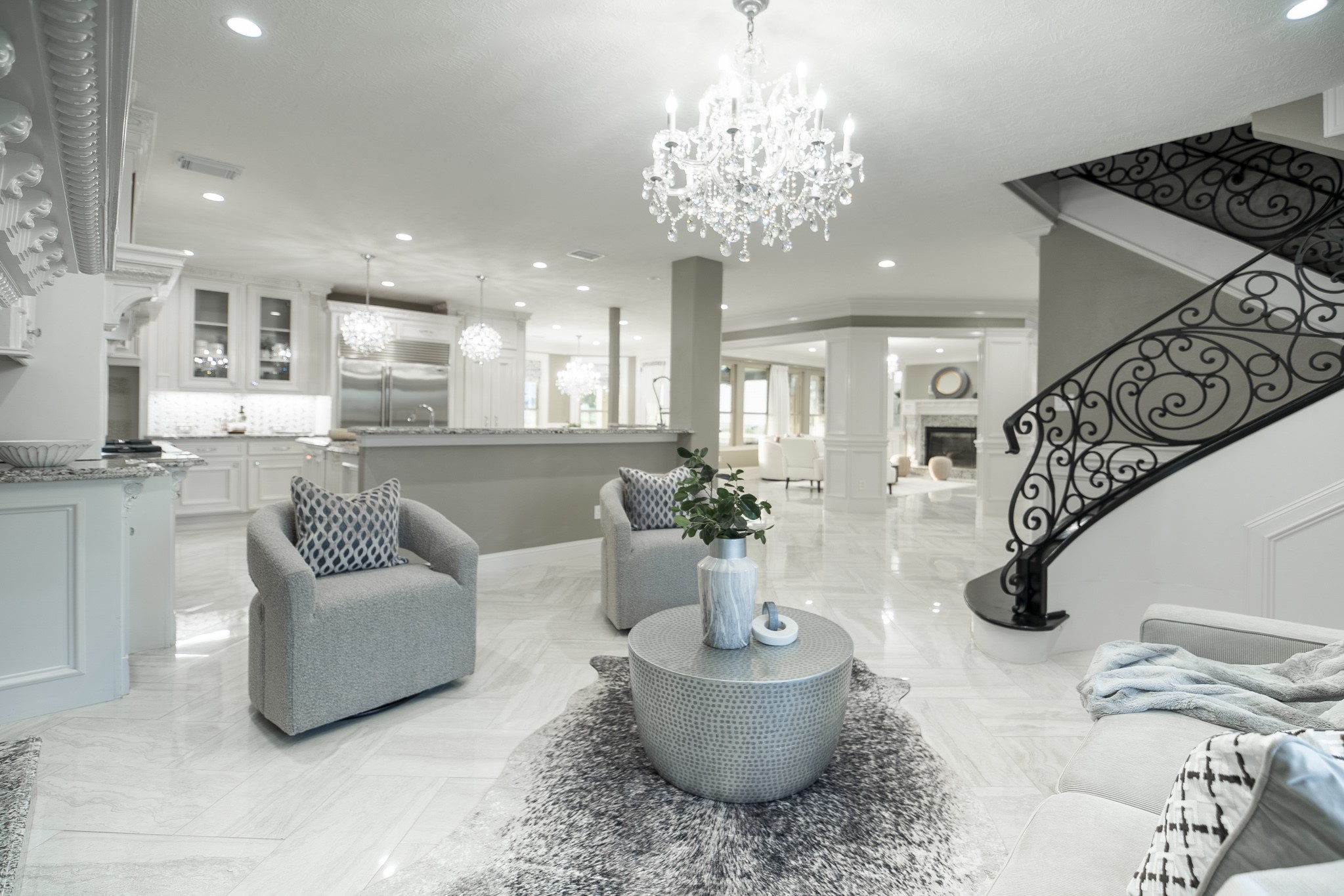 10887 Decatur Street Willis, TX 77318 - Photo 22 of 50 a living room with furniture and a chandelier