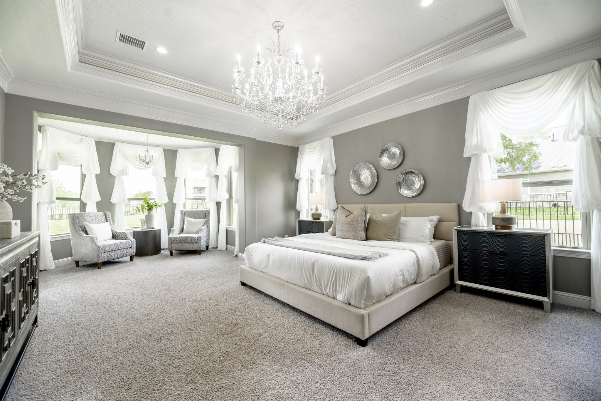 10887 Decatur Street Willis, TX 77318 - Photo 23 of 50 a spacious bedroom with a bed and a large window