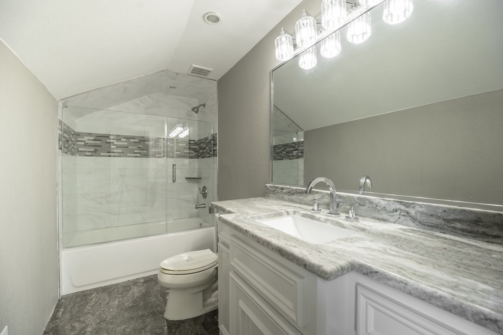 10887 Decatur Street Willis, TX 77318 - Photo 33 of 50 a bathroom with a sink a toilet and shower