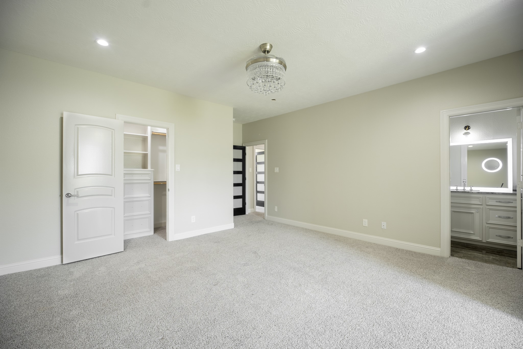 10887 Decatur Street Willis, TX 77318 - Photo 41 of 50 an empty room with closet and windows