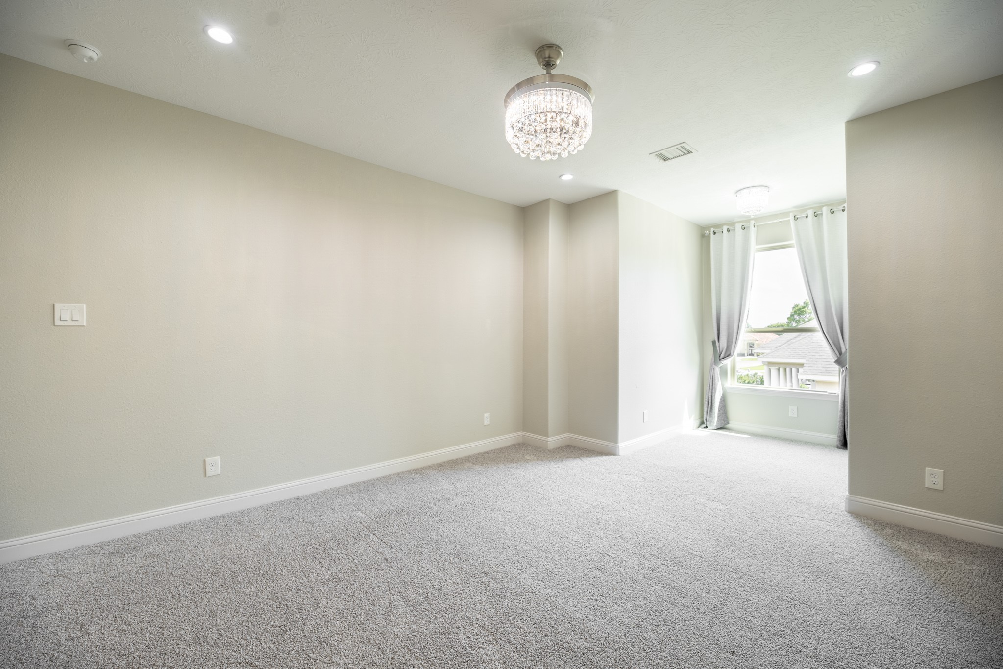 10887 Decatur Street Willis, TX 77318 - Photo 43 of 50 a view of an empty room and a window