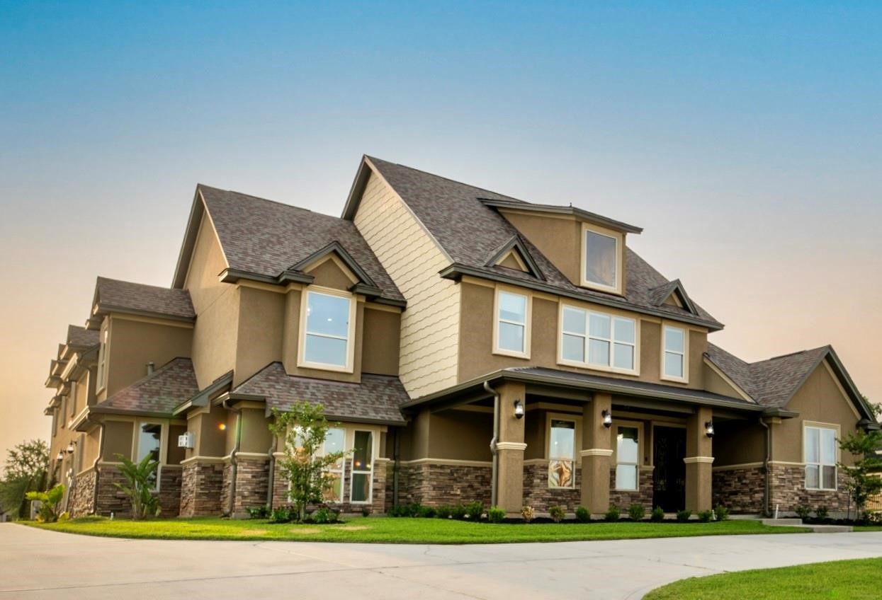 10887 Decatur Street Willis, TX 77318 - Photo 5 of 50 a front view of a residential apartment building with a yard