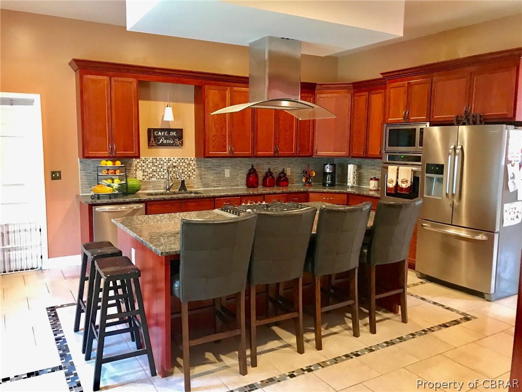 3939 Funny Farm Road Hayes, VA 23072 - Photo 5 of 17 Kitchen with large center island, granite counters and tile flooring. Additional cabinets with pantry and storage just out of sight in bottom right of pic.