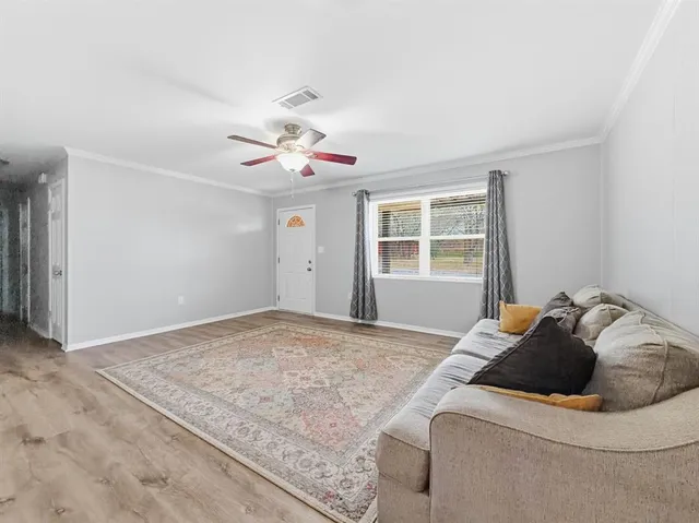 a view of a bedroom with a bed and closet
