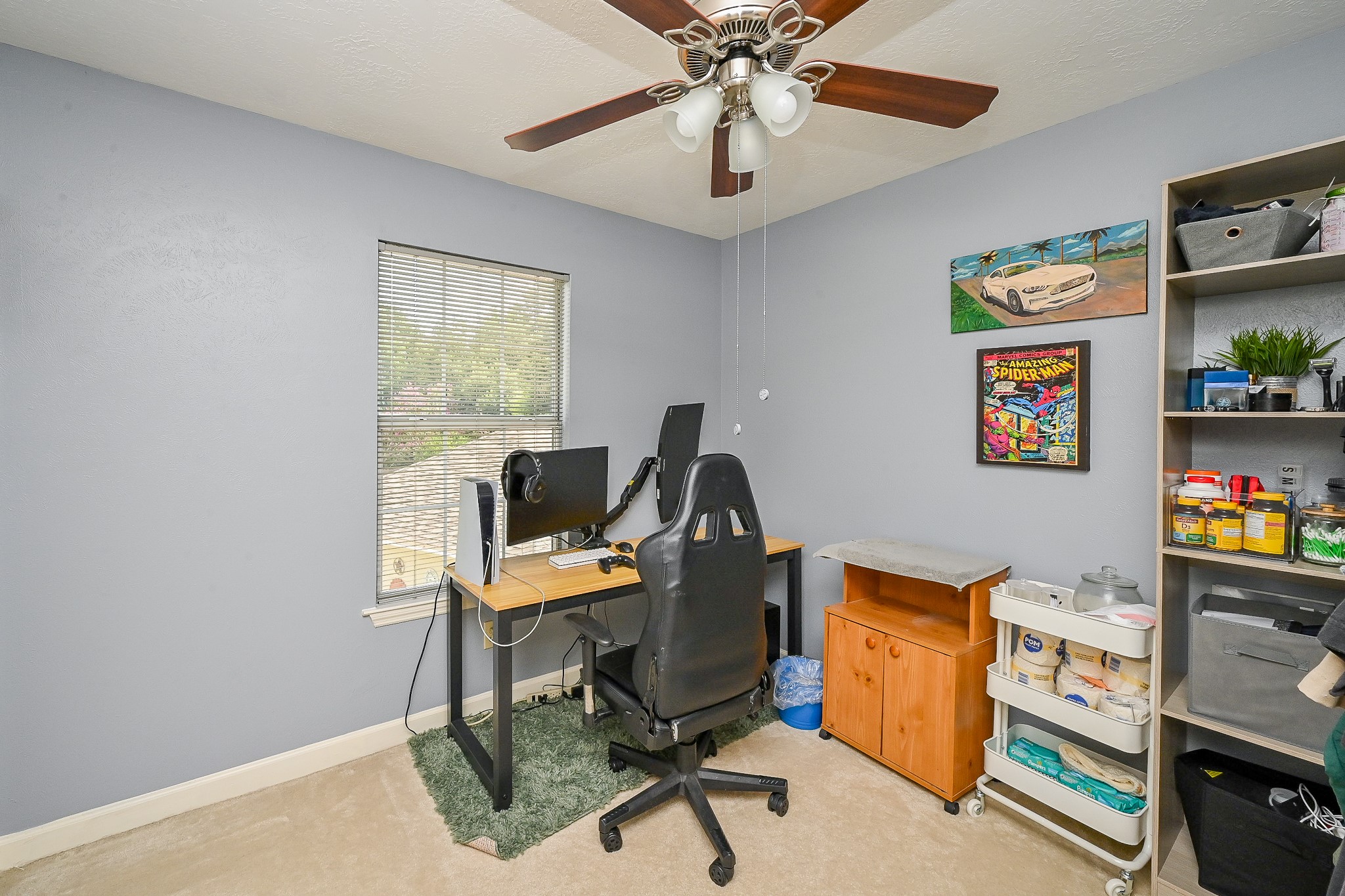17518 Rustling Aspen Lane Houston, TX 77095 - Photo 17 of 39 a view of a workspace with furniture and a window