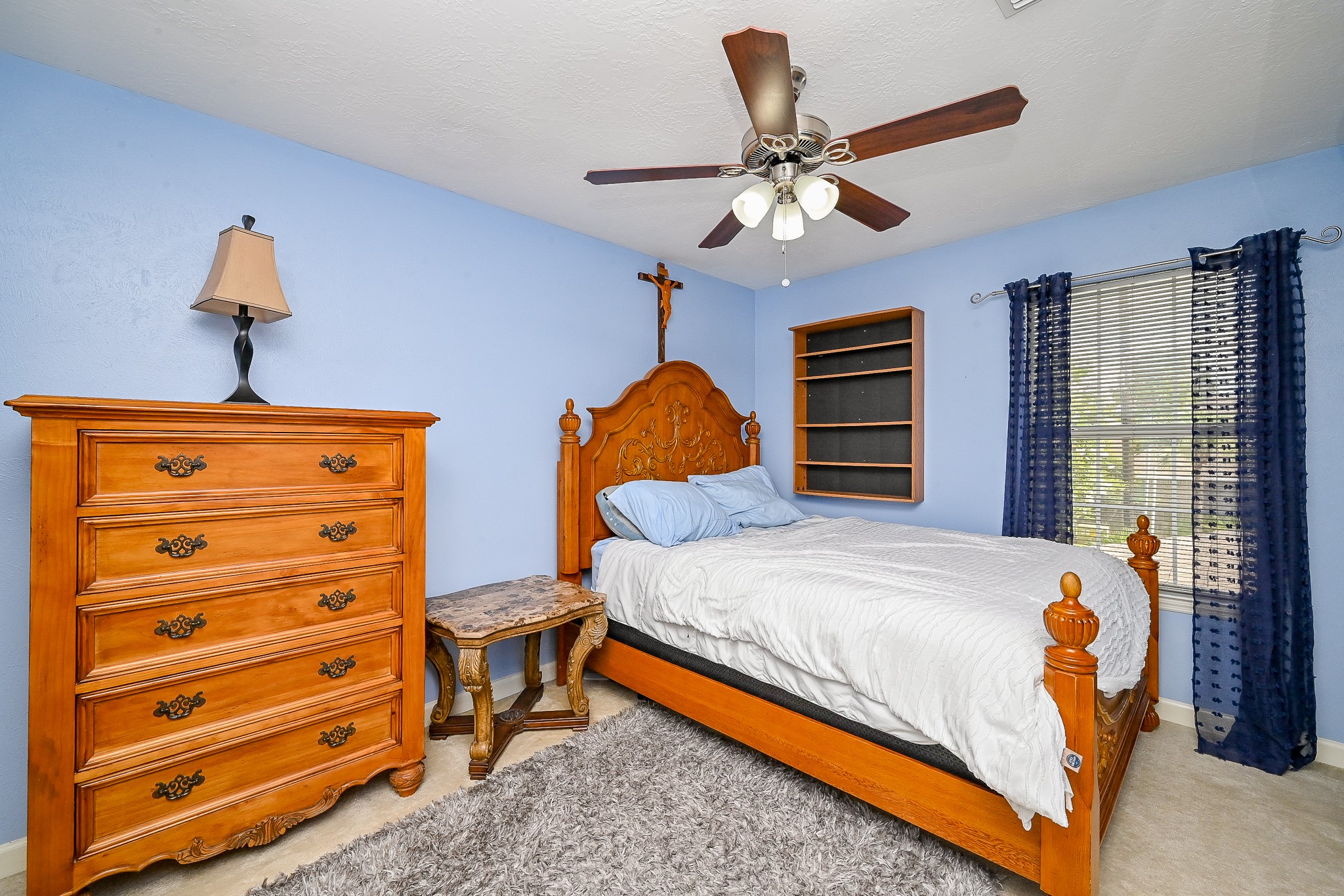 17518 Rustling Aspen Lane Houston, TX 77095 - Photo 20 of 39 a bedroom with bed and wooden floor