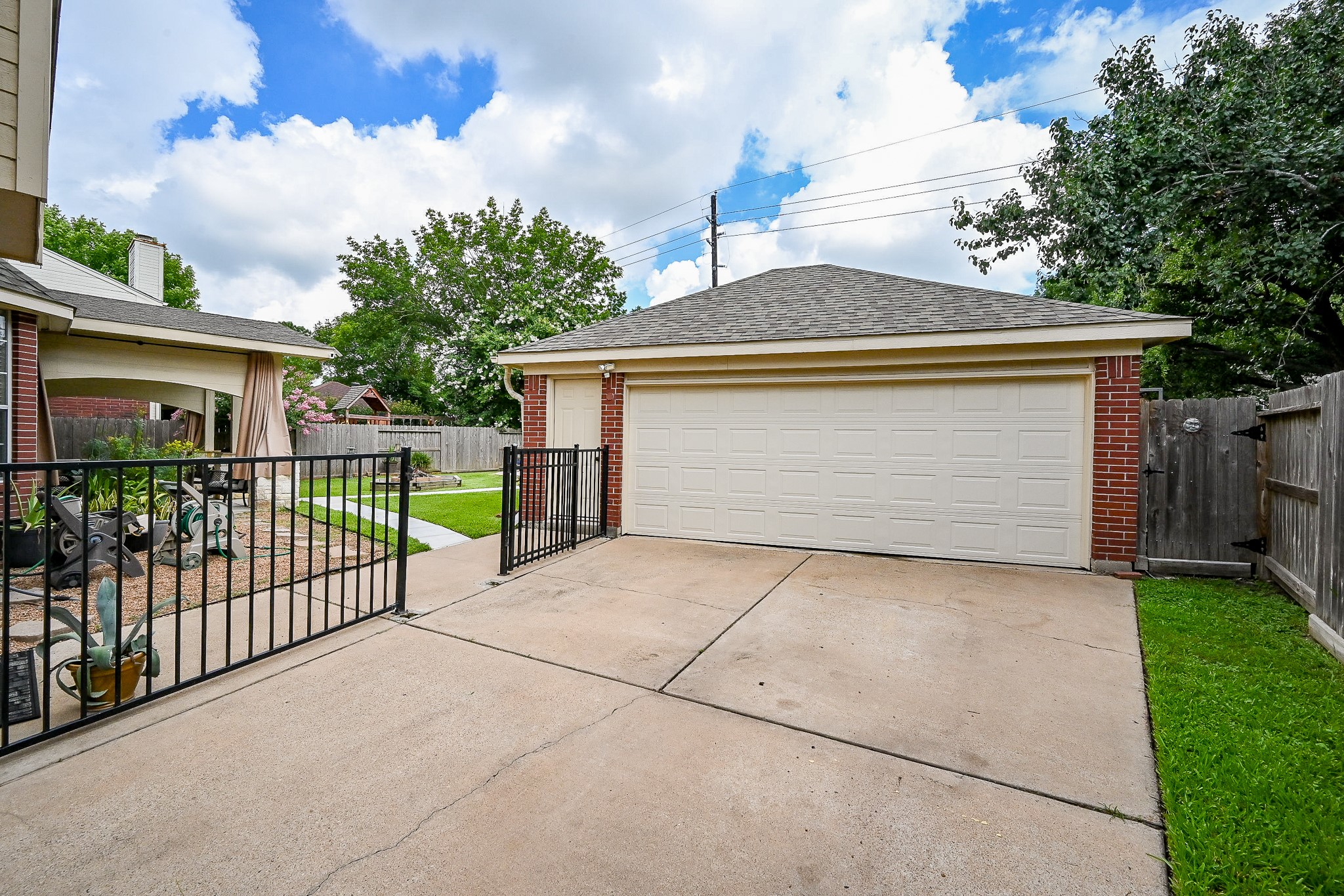 17518 Rustling Aspen Lane Houston, TX 77095 - Photo 3 of 39 a front view of a house with a garage