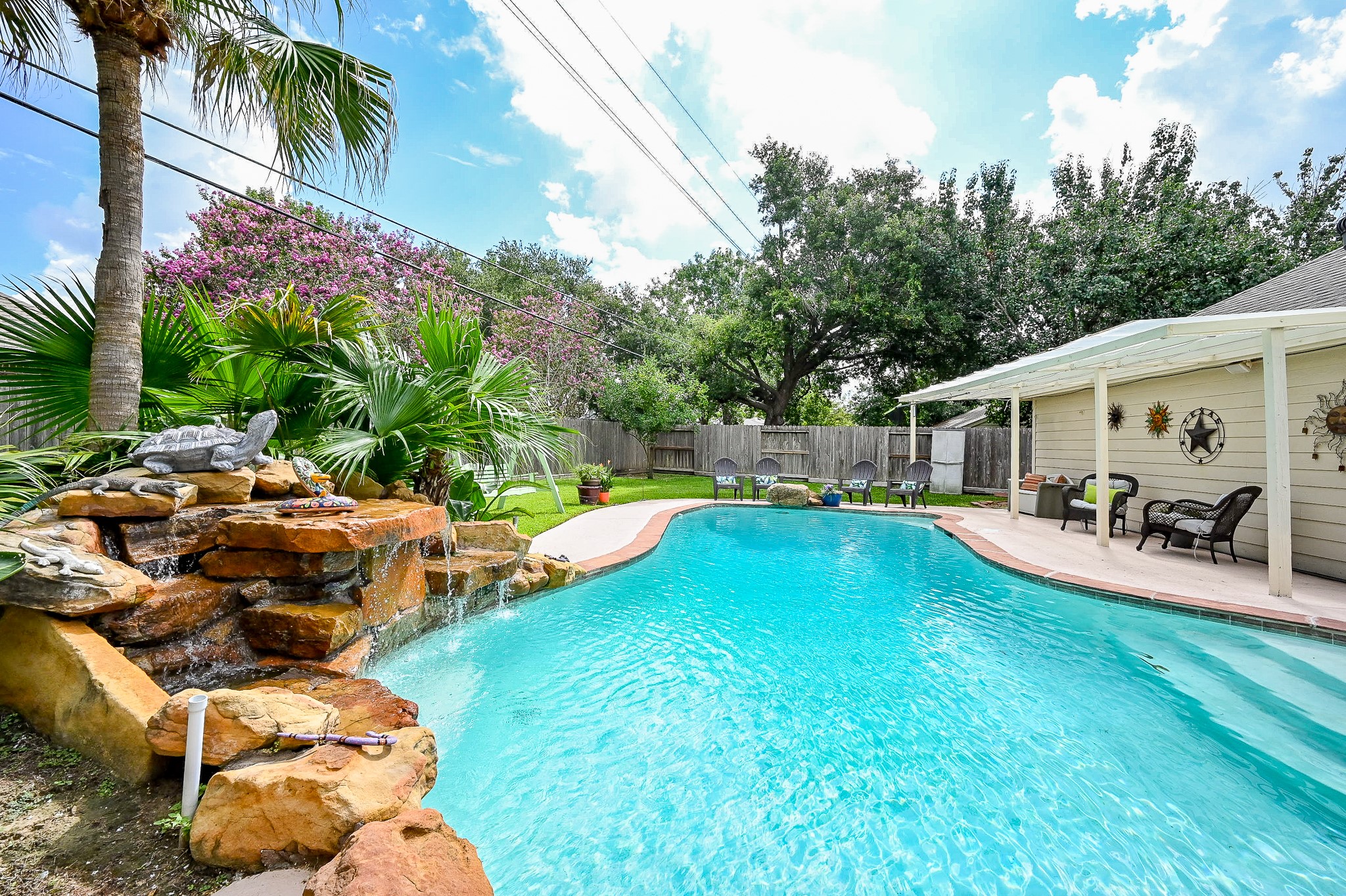 17518 Rustling Aspen Lane Houston, TX 77095 - Photo 34 of 39 a view of a house with swimming pool and sitting area