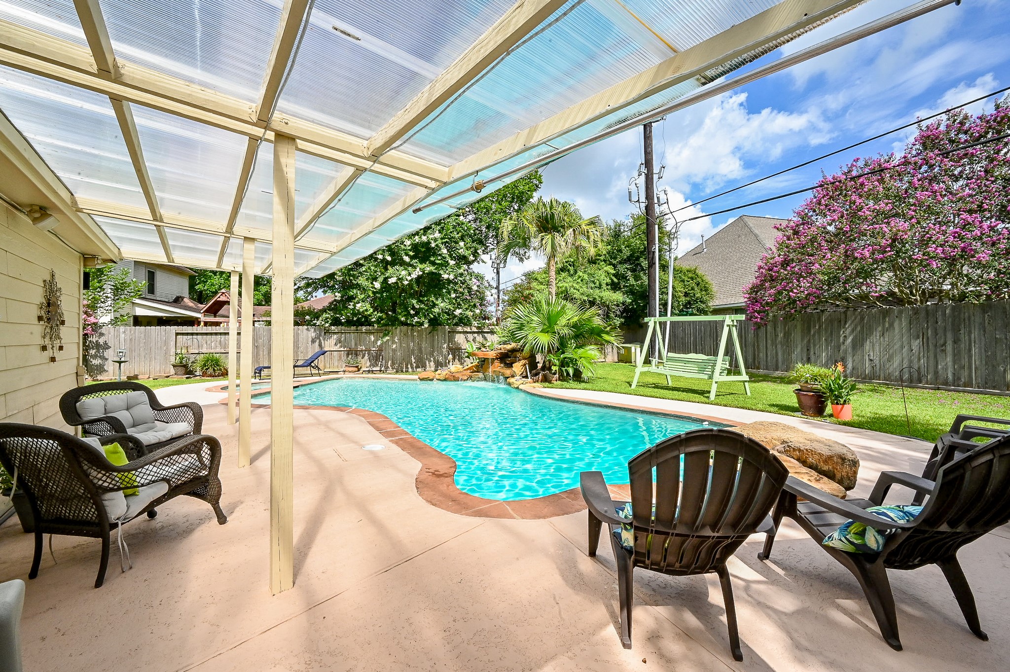17518 Rustling Aspen Lane Houston, TX 77095 - Photo 35 of 39 a view of a patio with table and chairs and potted plants
