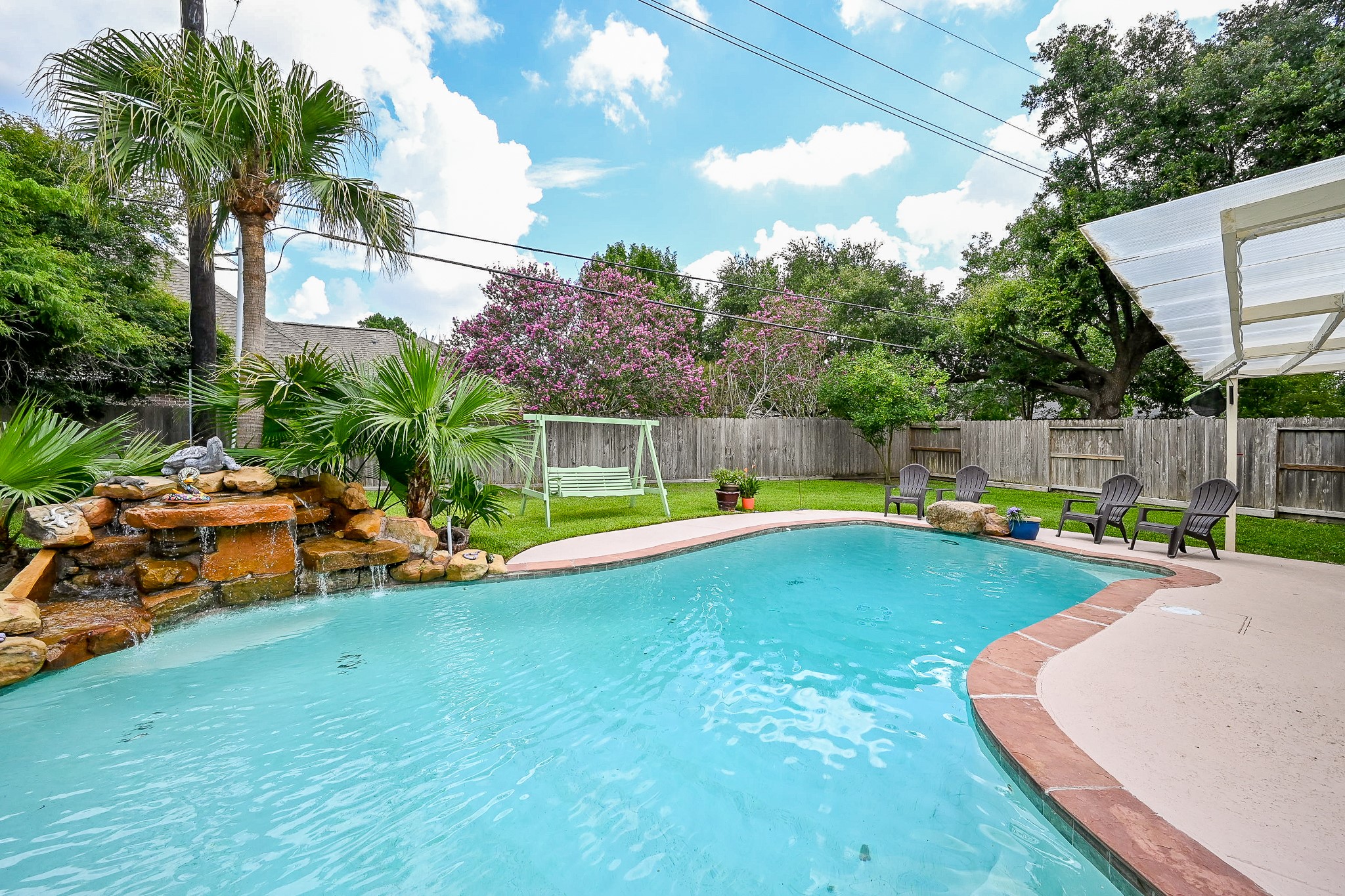 17518 Rustling Aspen Lane Houston, TX 77095 - Photo 37 of 39 a view of a backyard with swimming pool