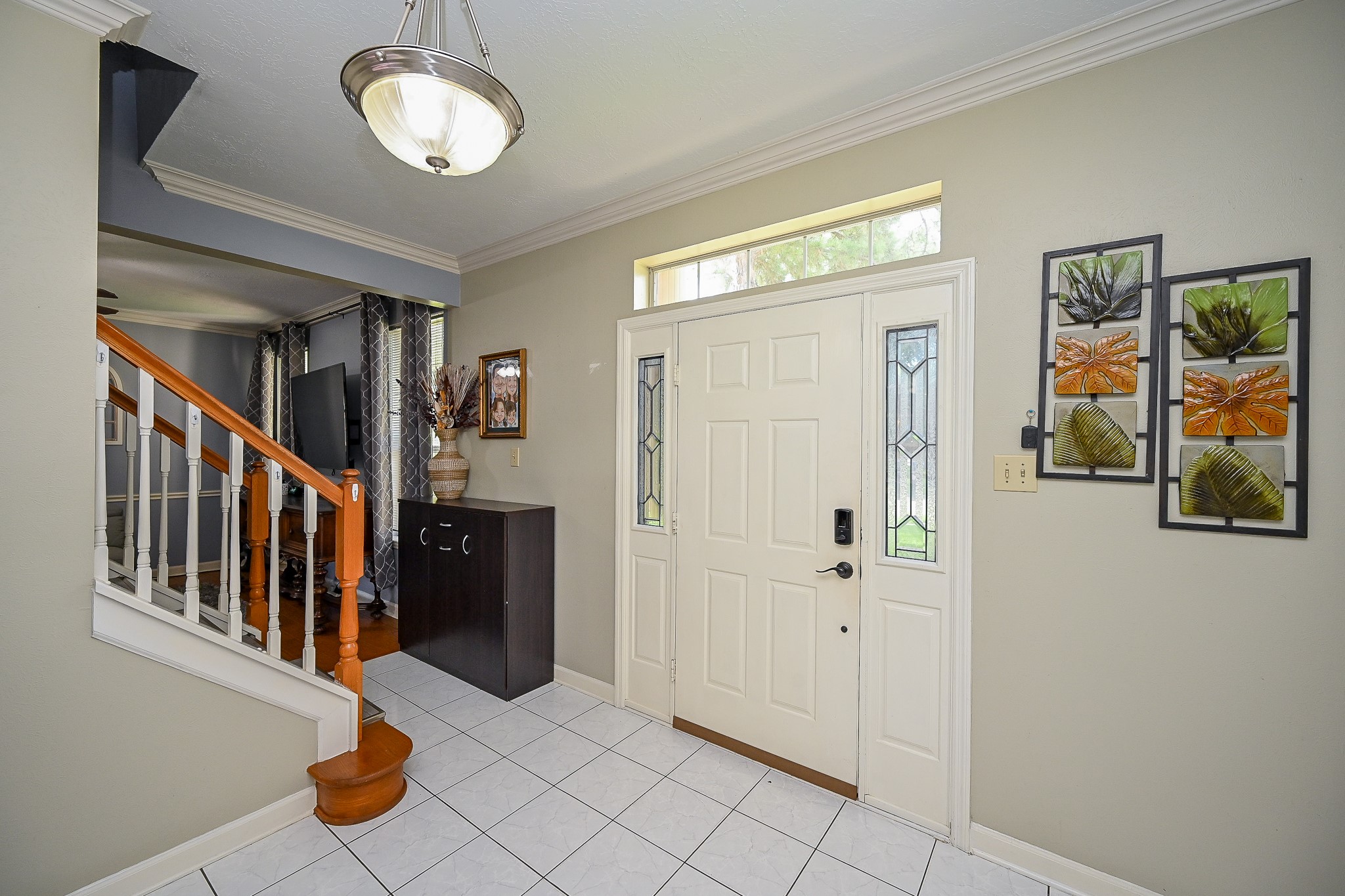17518 Rustling Aspen Lane Houston, TX 77095 - Photo 6 of 39 a view of an entryway with wooden floor