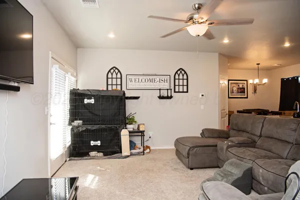 a kitchen with granite countertop a sink stainless steel appliances and cabinets
