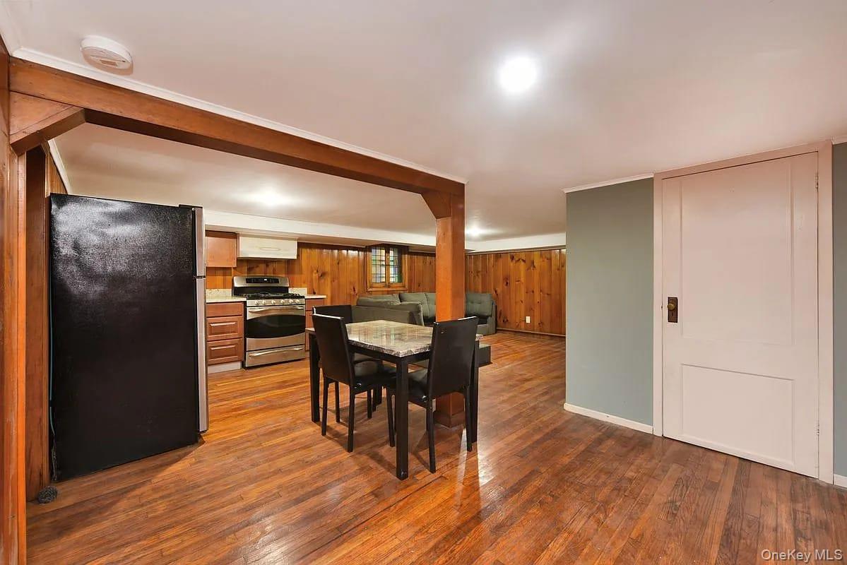 108-30 67th Avenue Queens, NY 11375 - Photo 15 of 29 a view of a dining room with furniture and wooden floor