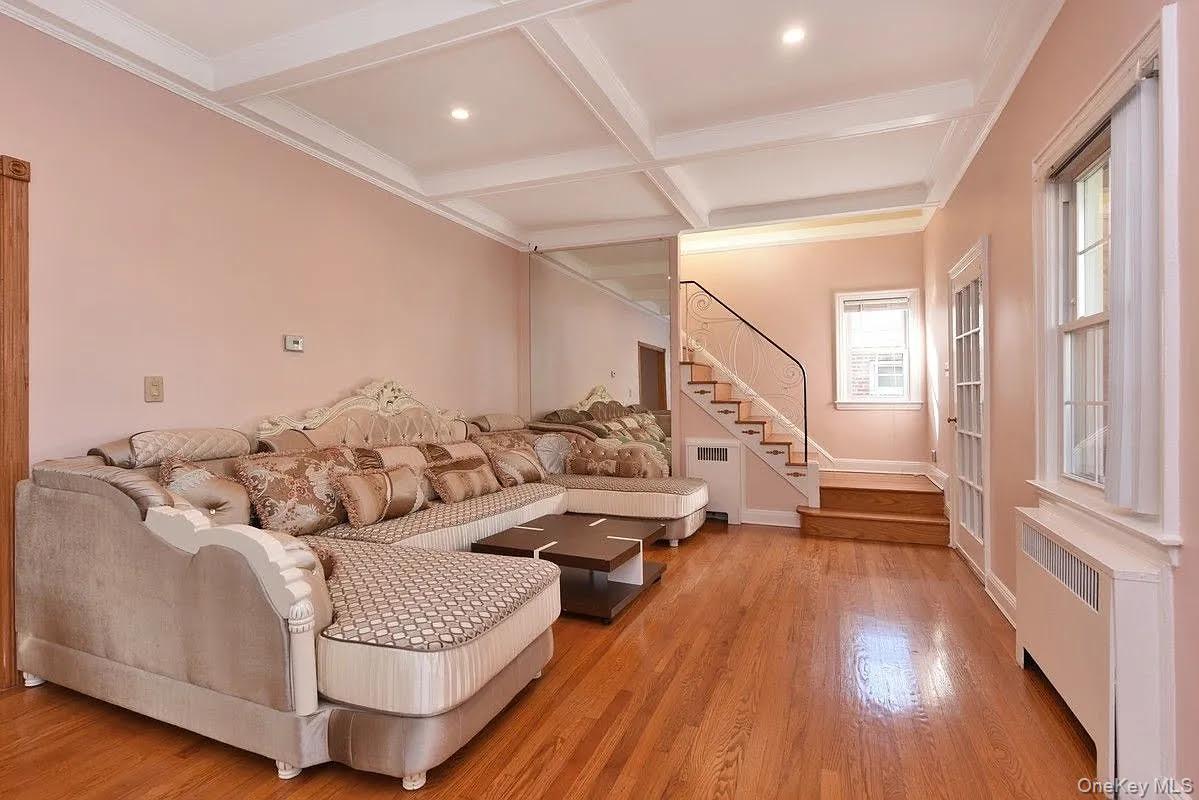 108-30 67th Avenue Queens, NY 11375 - Photo 2 of 29 a living room with furniture and wooden floor