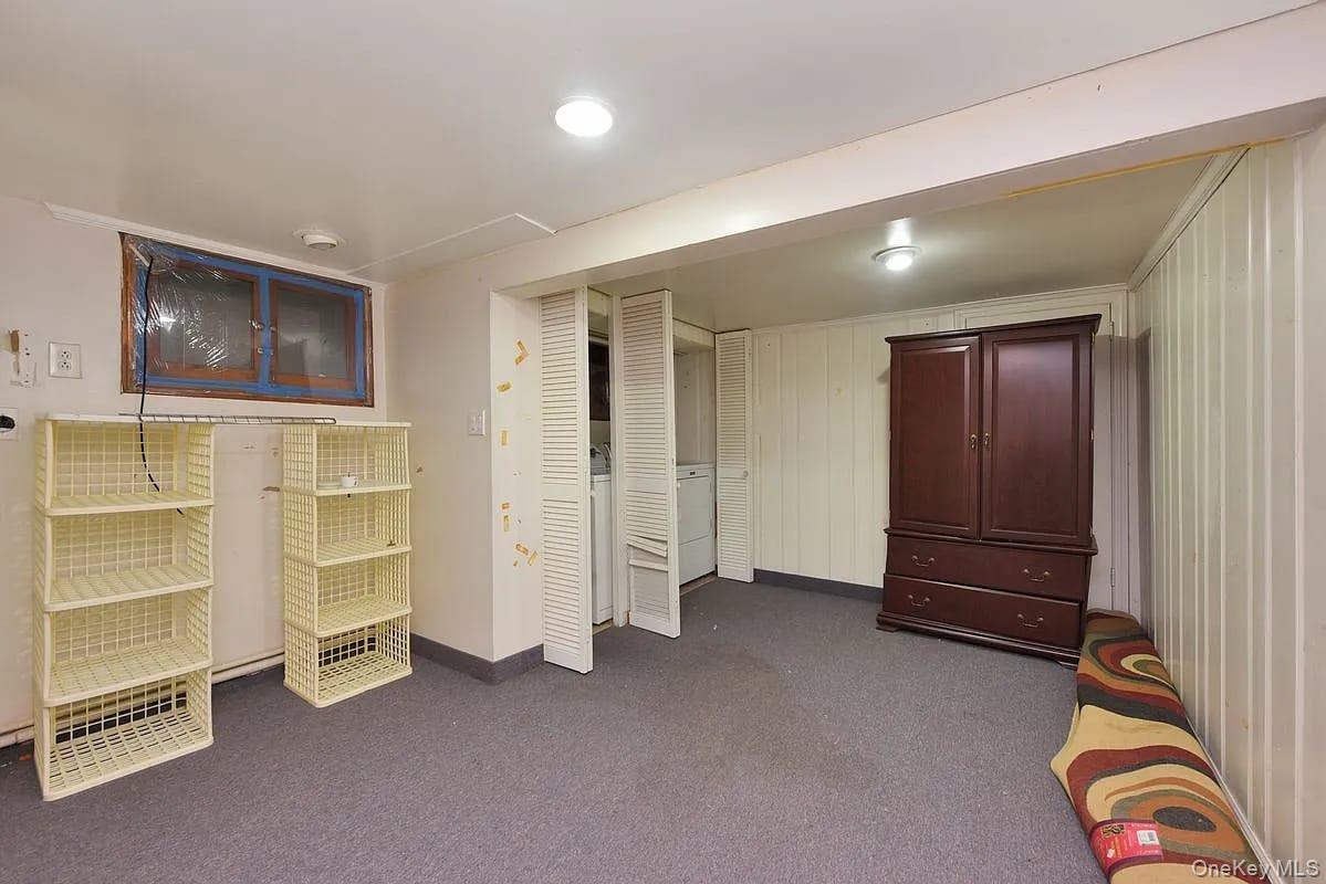 108-30 67th Avenue Queens, NY 11375 - Photo 21 of 29 a view of an empty room with a closet