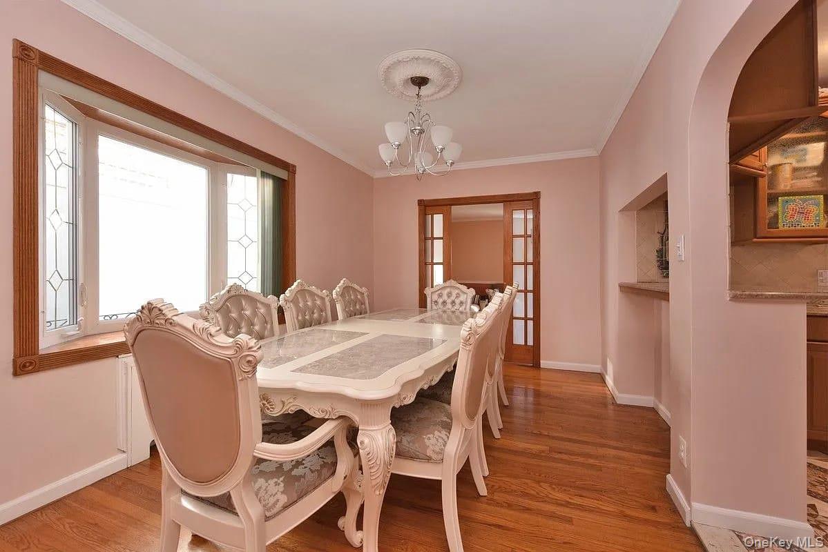 108-30 67th Avenue Queens, NY 11375 - Photo 5 of 29 a view of a dining room with furniture window and wooden floor