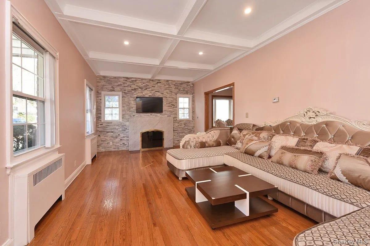 108-30 67th Avenue Queens, NY 11375 - Photo 6 of 29 a living room with furniture and a fireplace