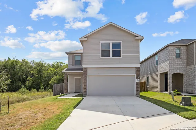a front view of house with yard